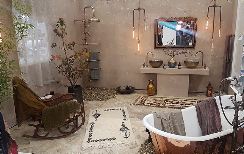 Grand designs room set featuring an industrial style shower and copper bath from EDW Interiors